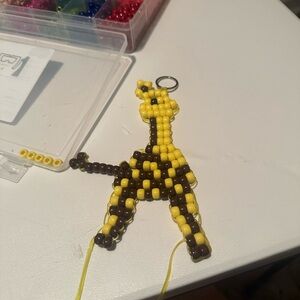 Playful Yellow and Brown Beaded Giraffe Keychain